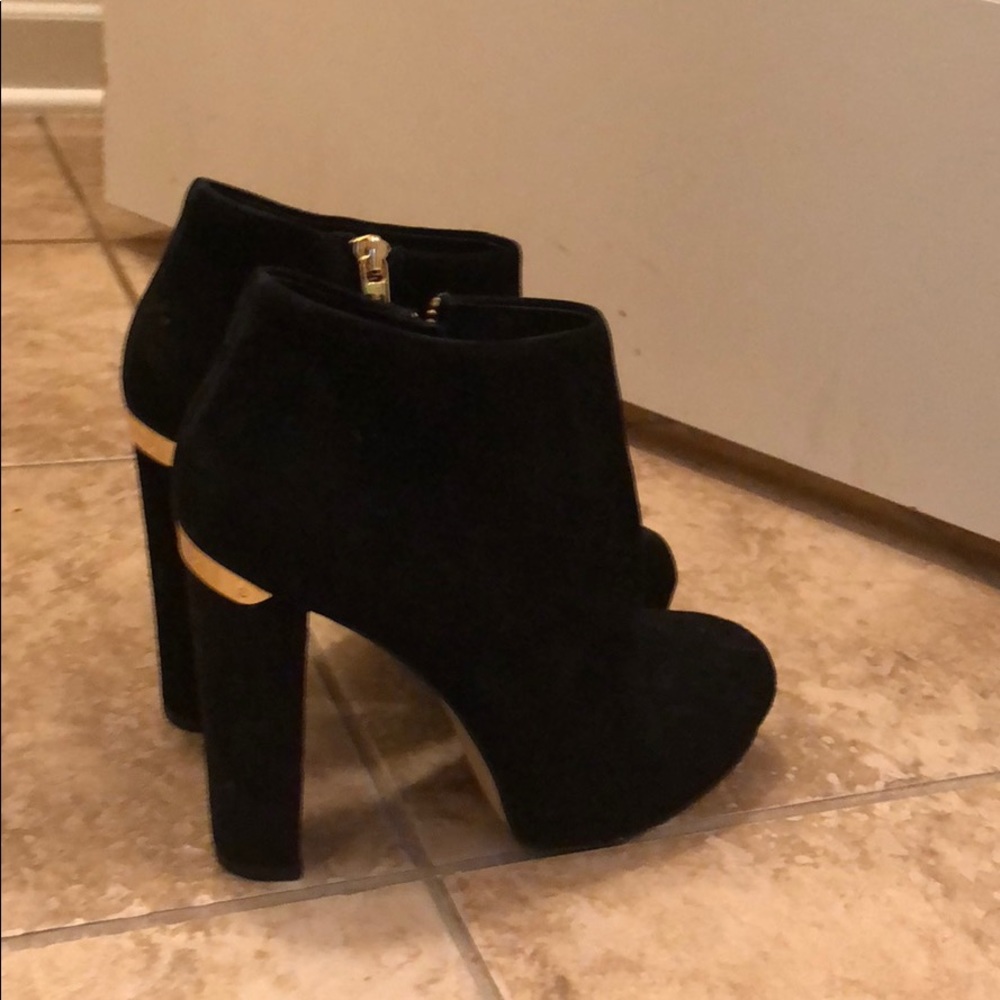 Michael Kori short boot with high heel.